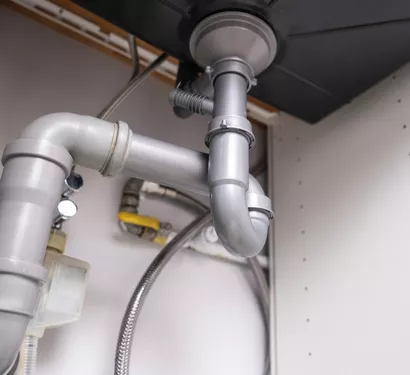 Technician installing a new bathroom sink in Tempe
