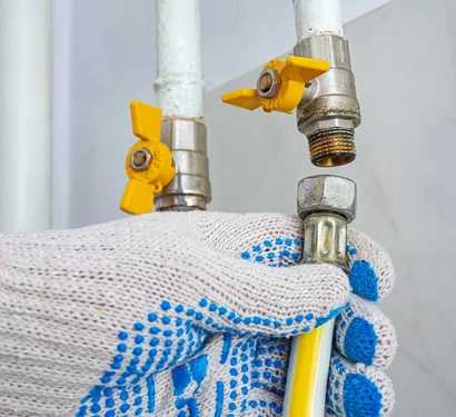Technician locating a hidden leak in a Tempe property