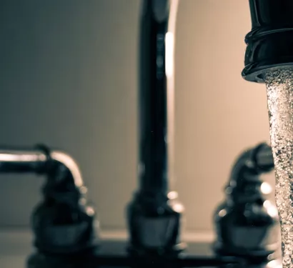 Fixing a leaking kitchen pipe in Tempe