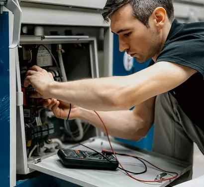 Kitchen plumbing inspection in a Tempe property