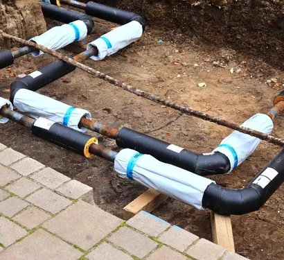 Installing pipe insulation in a Tempe property
